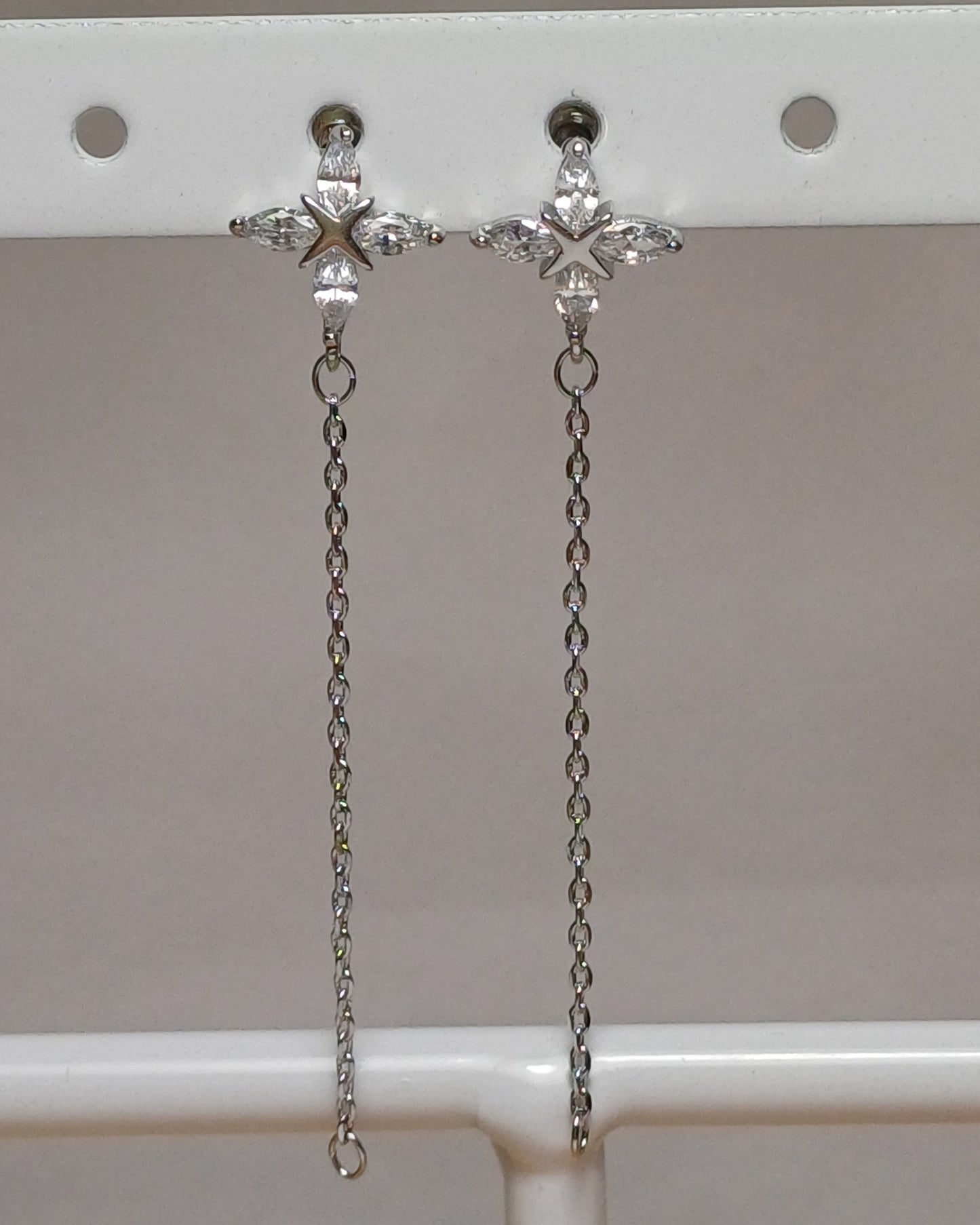 Long flower earrings.