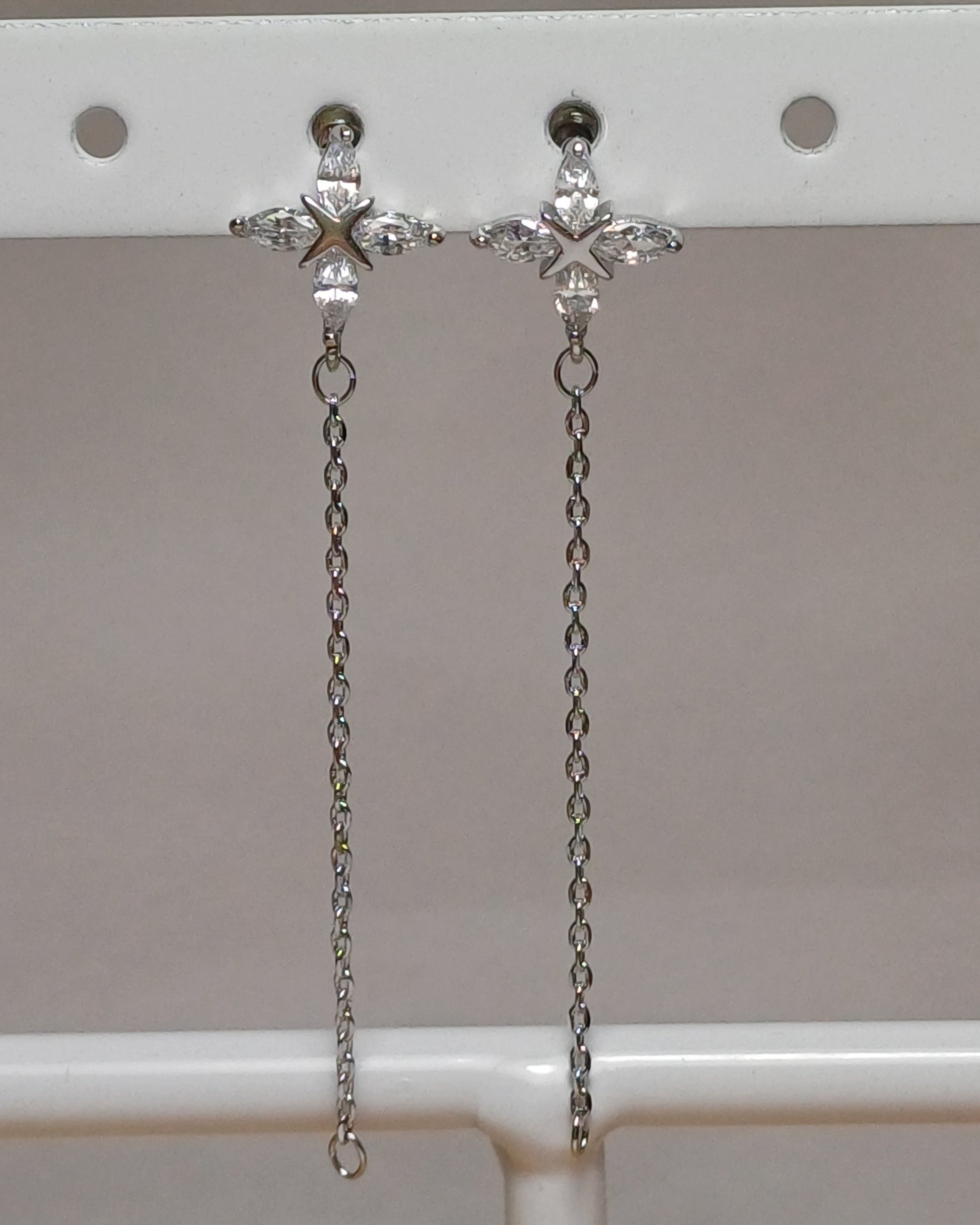 Long flower earrings.