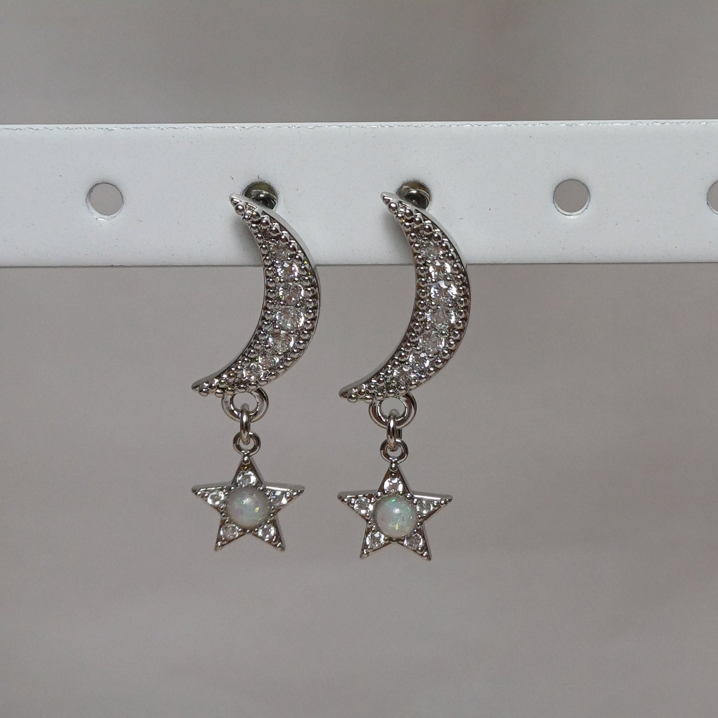 Moon and star earrings.