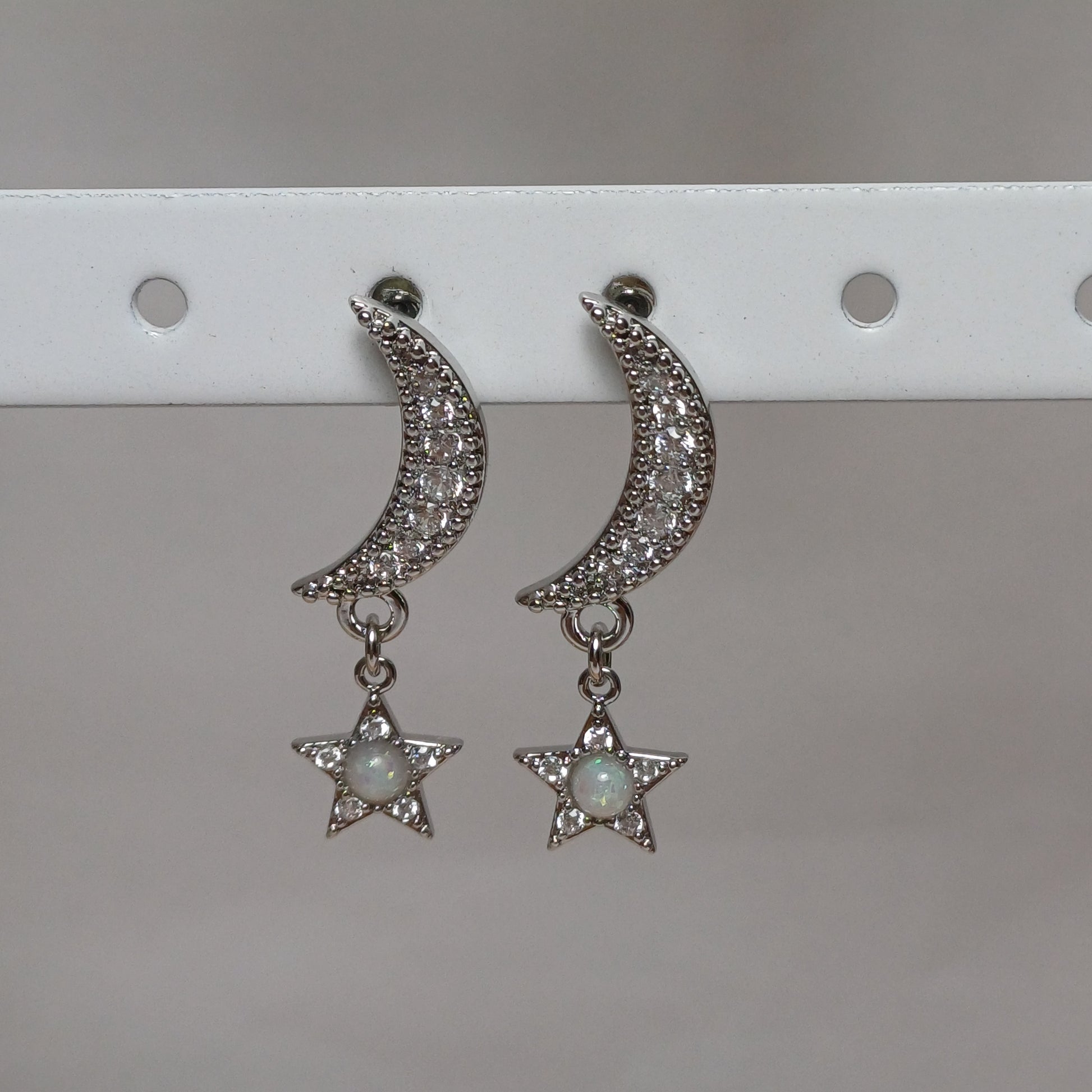 Moon and star earrings.