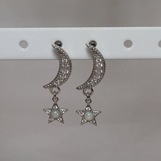 Moon and star earrings.