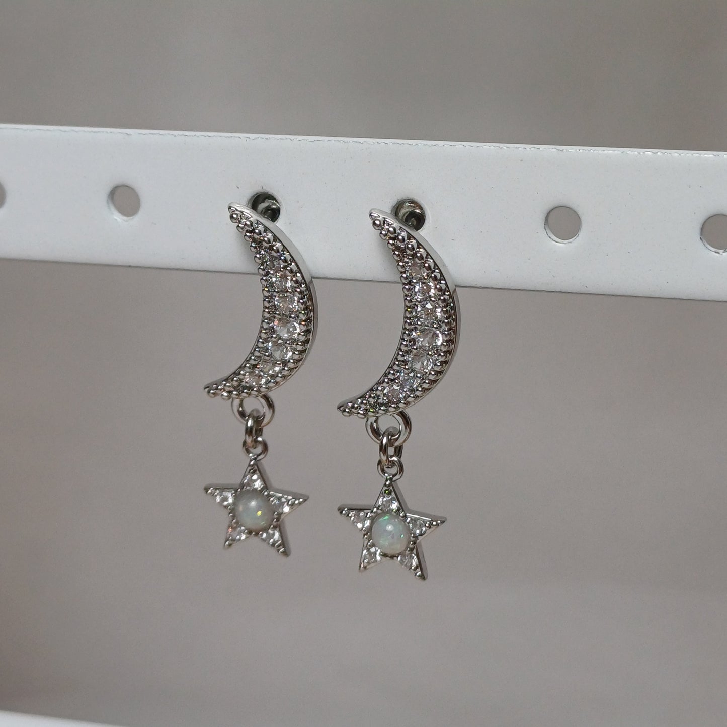 Moon and star earrings.