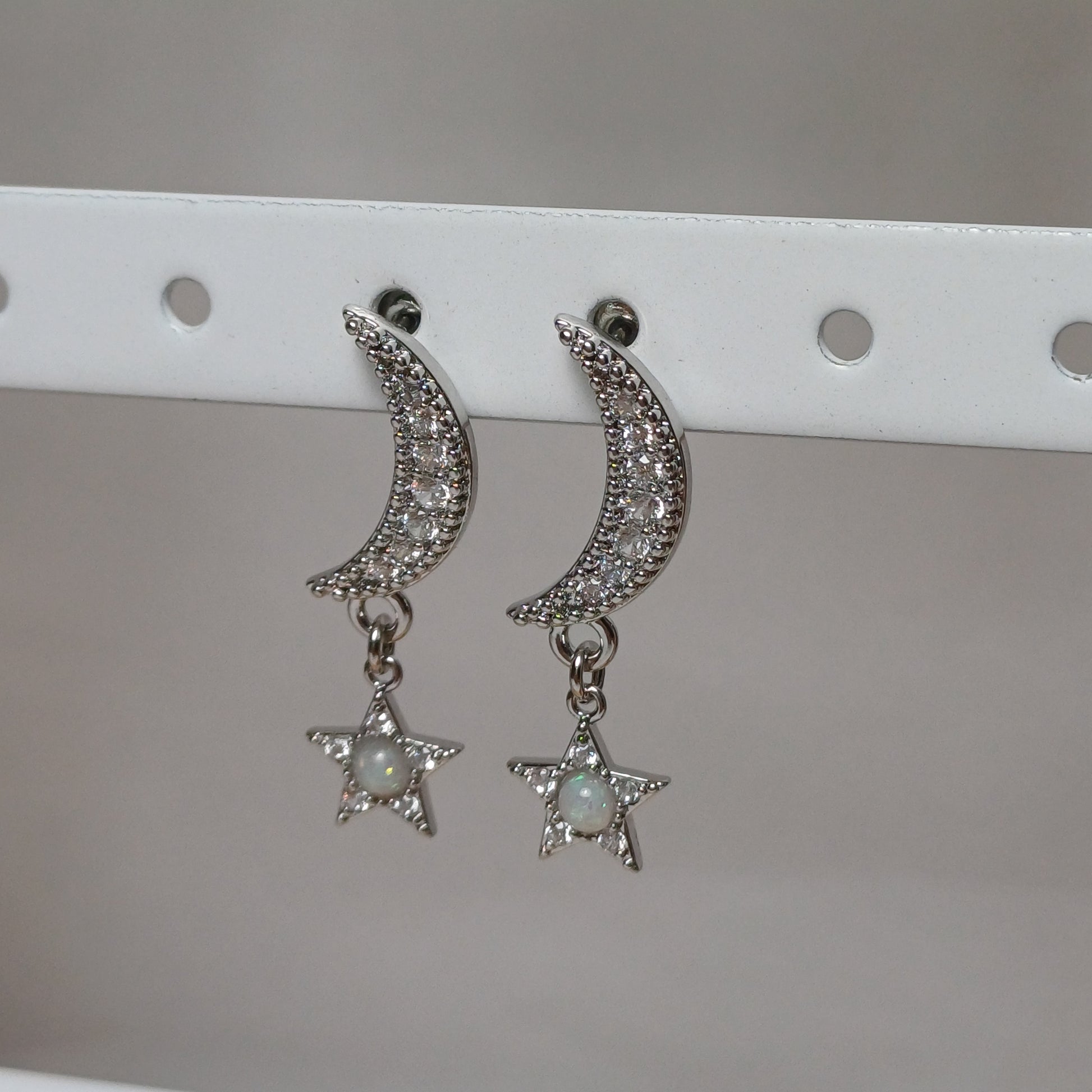 Moon and star earrings.