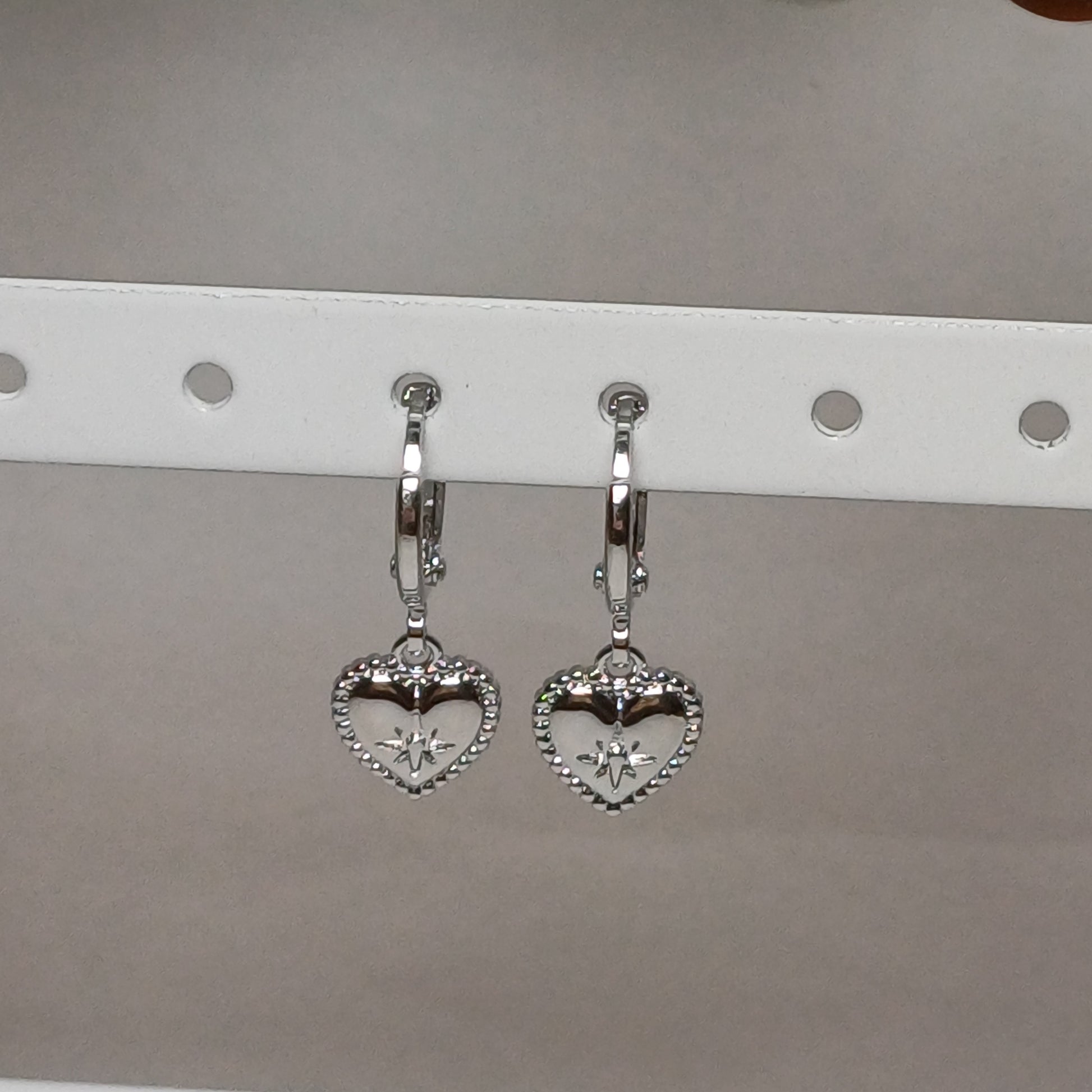 Sparkle heart earrings.
