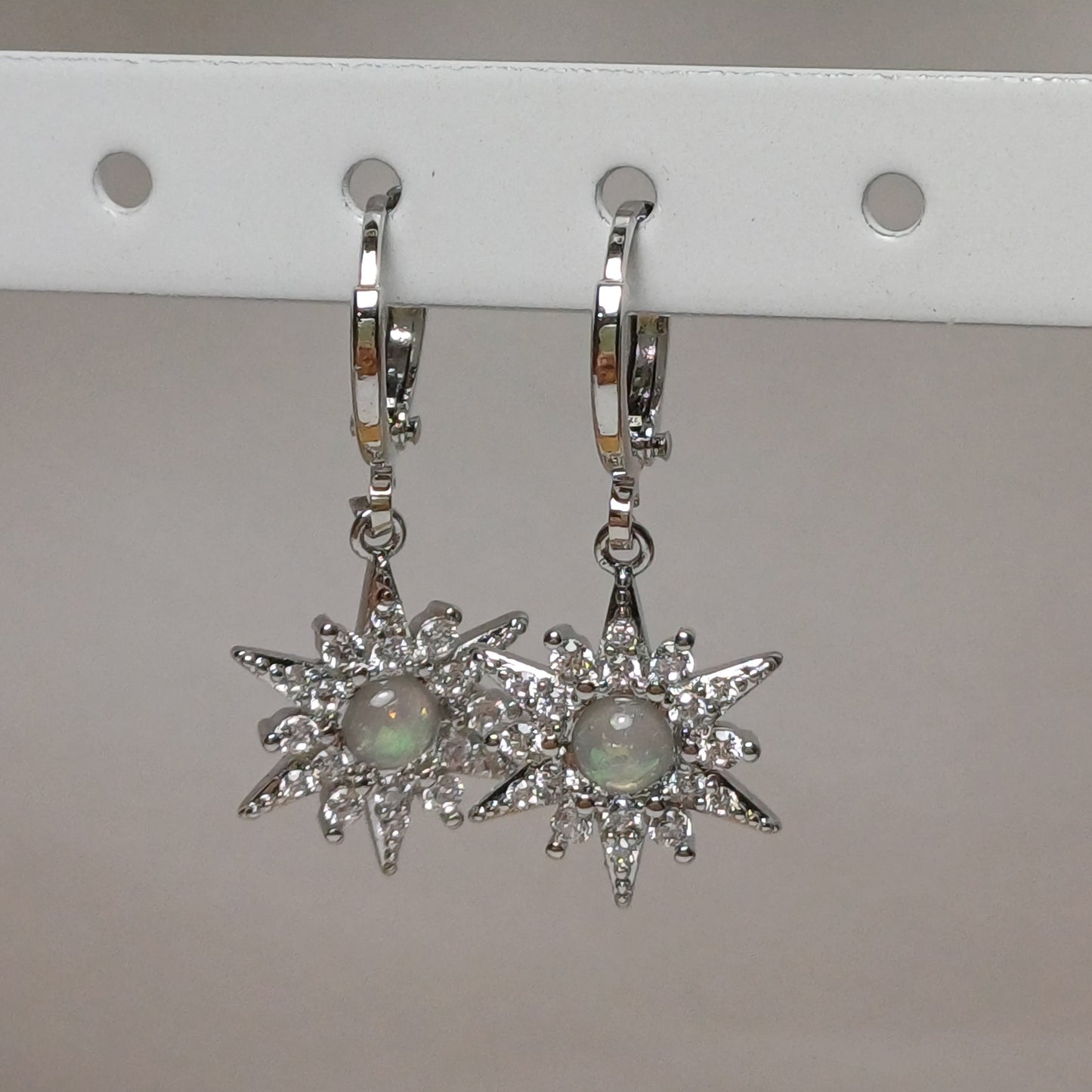 Rhinestone Sun earrings.