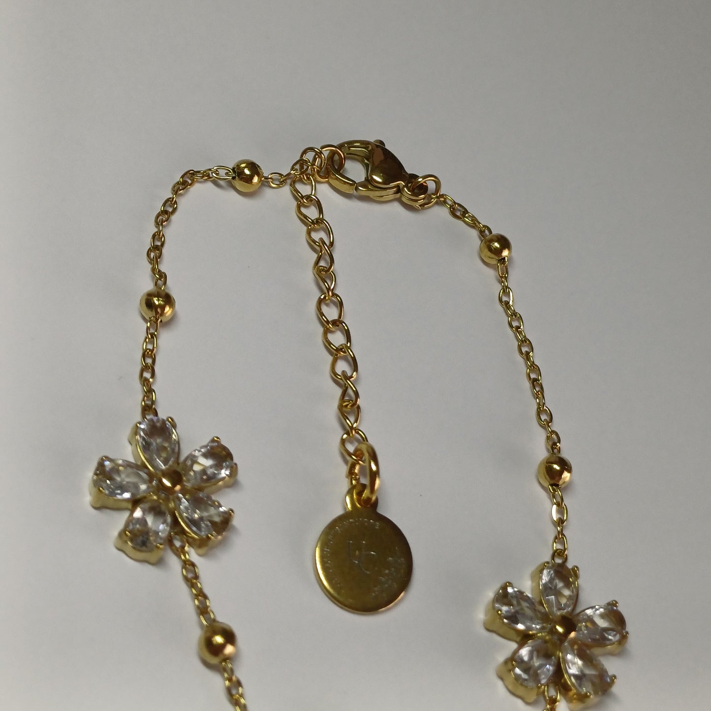 Gouden bloemen armband