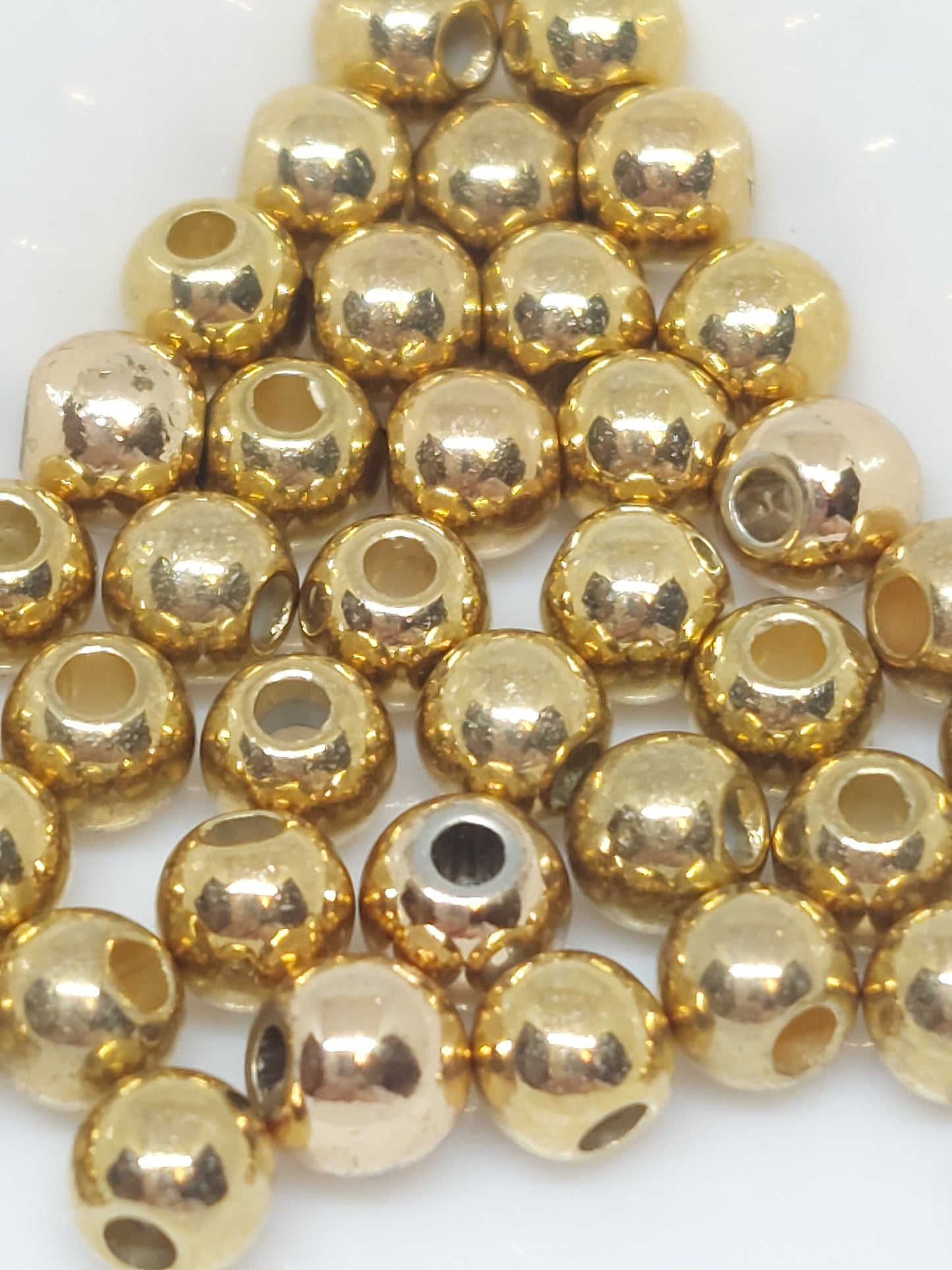 Round gold beads