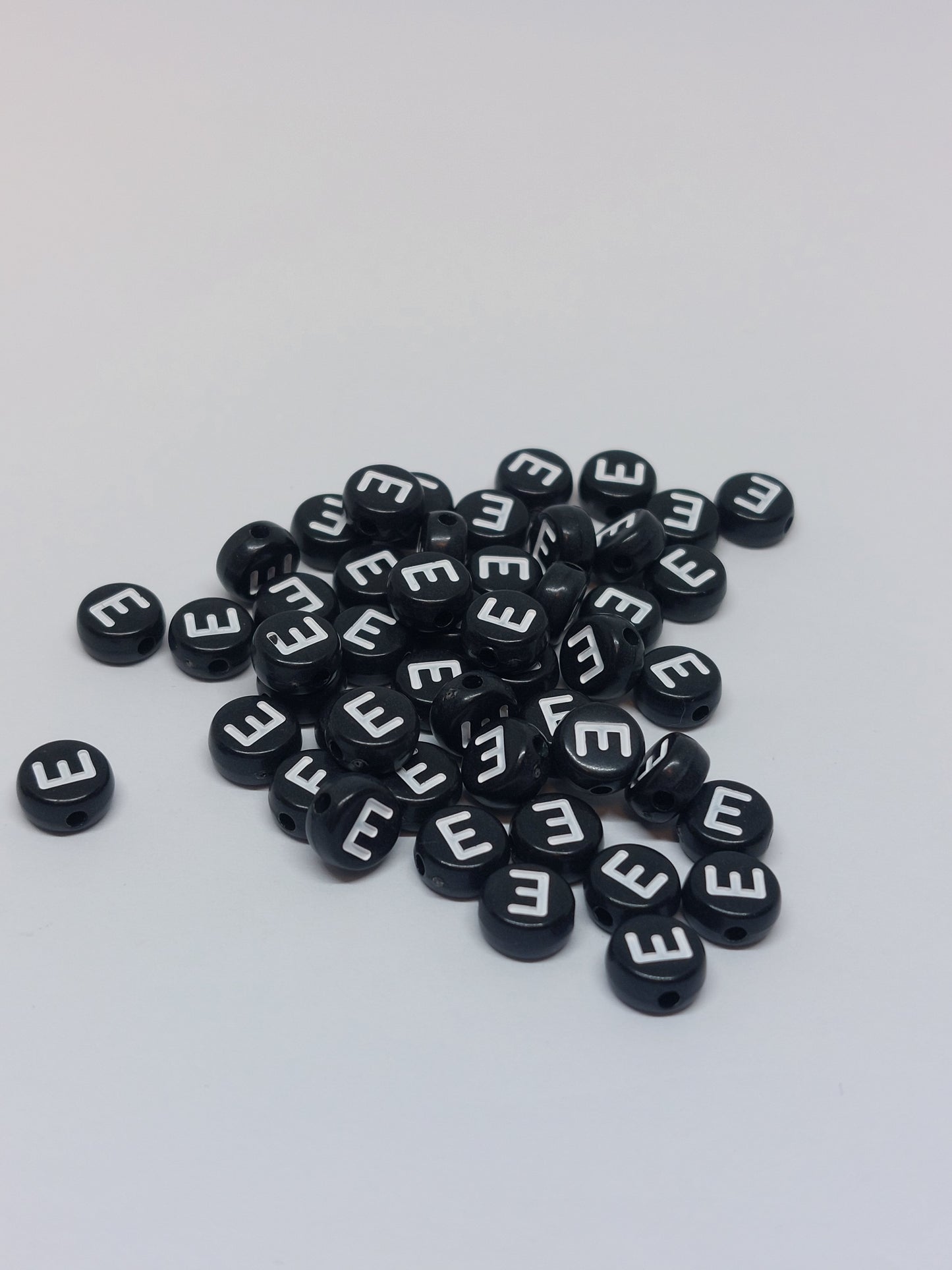 Letter beads black