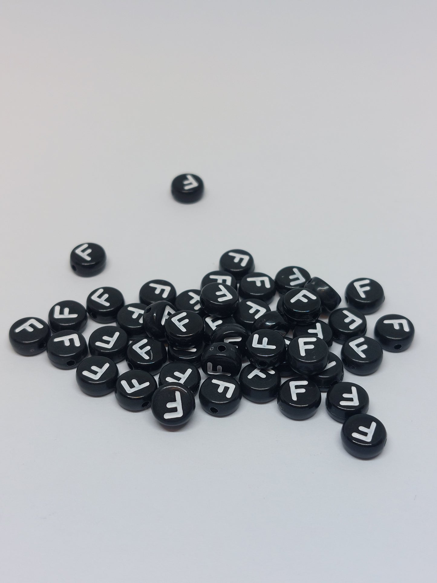 Letter beads black