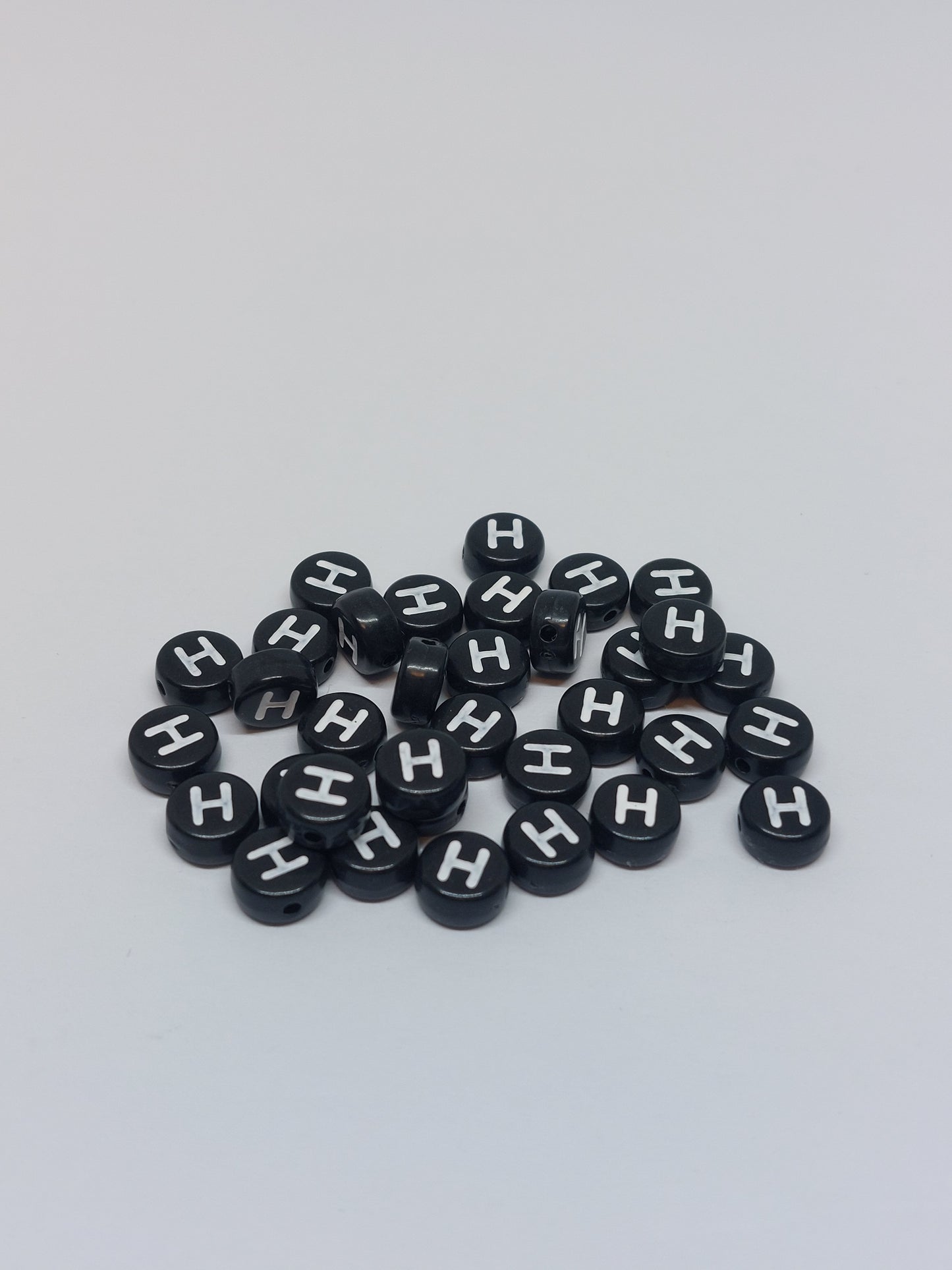 Letter beads black