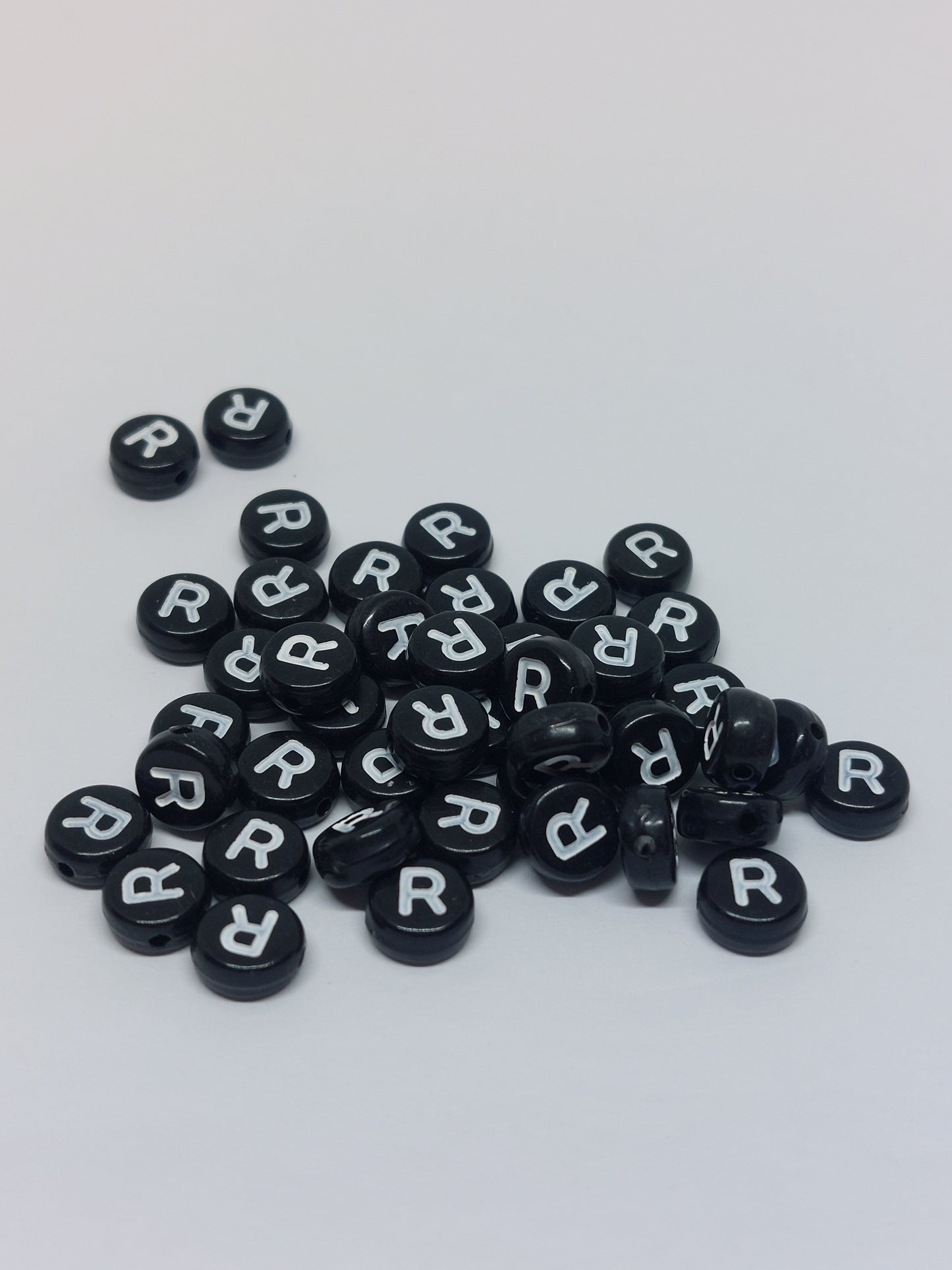 Letter beads black