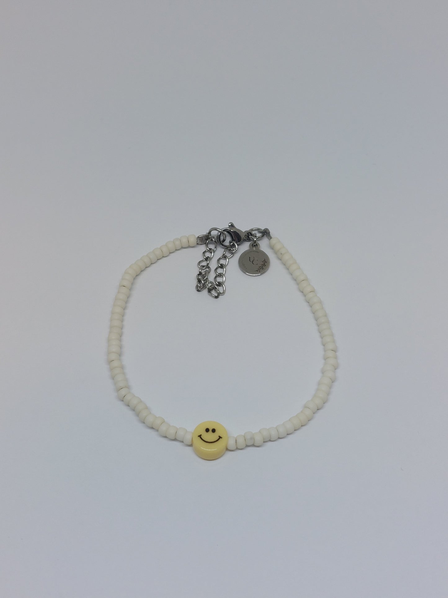 Yellow smiley armband