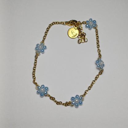 Golden flower blue armband