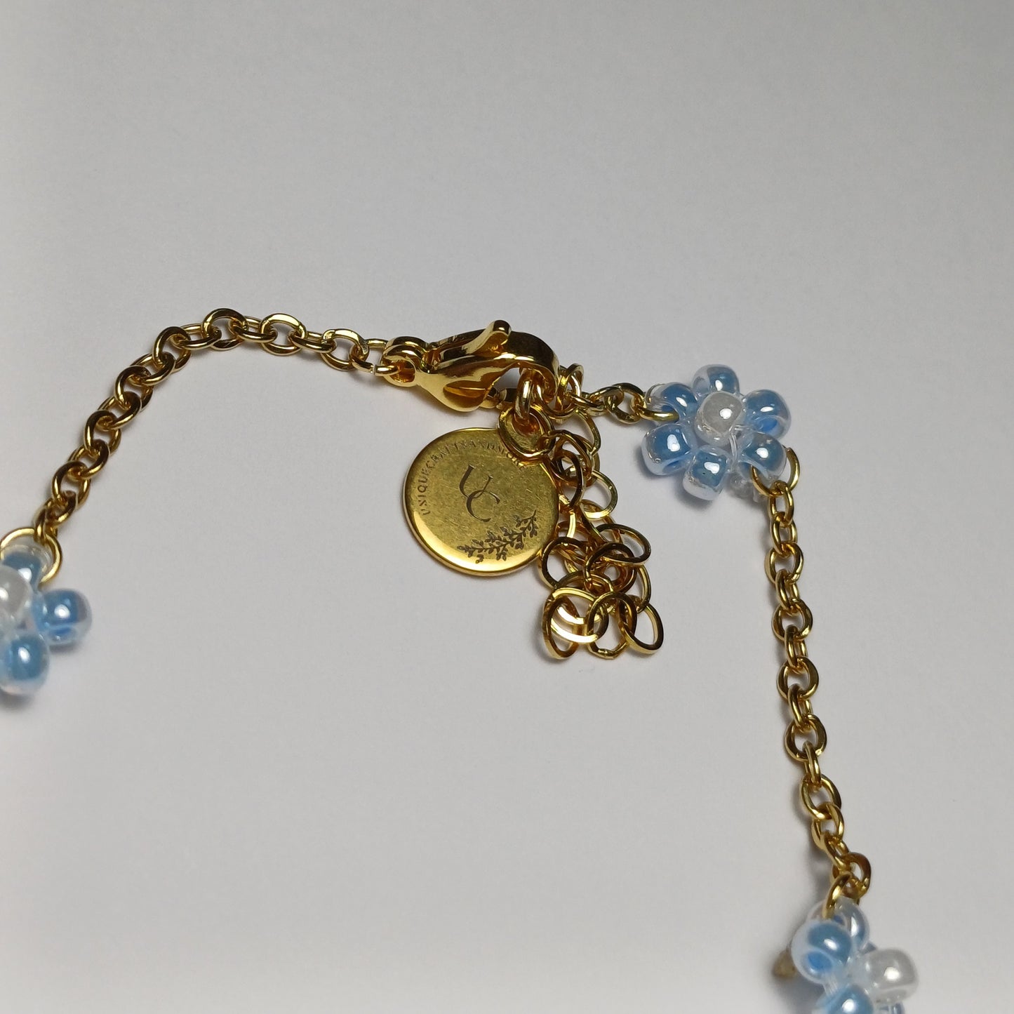 Golden flower blue bracelet