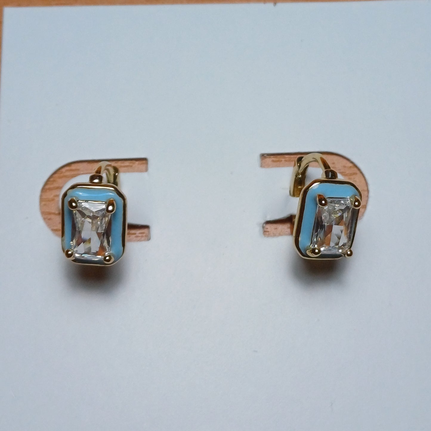 Blue diamond earrings.