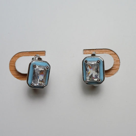 Blue diamond earrings.