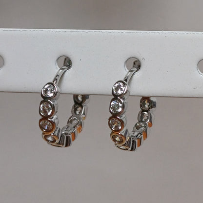 Diamond hoop earrings.