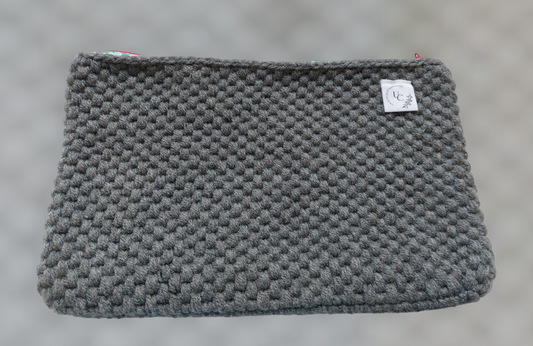 Gray crocheted toiletry bag