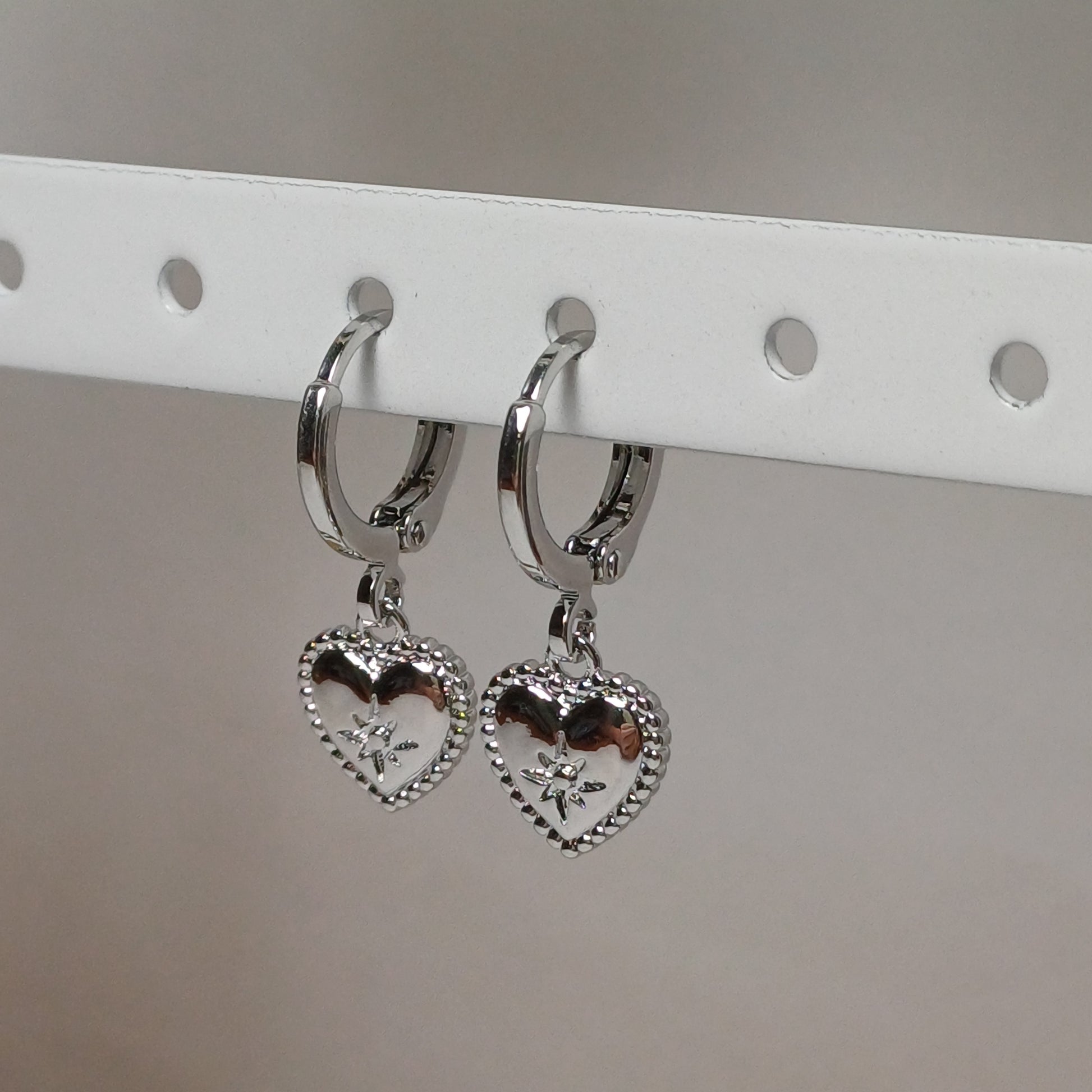 Sparkle heart earrings.