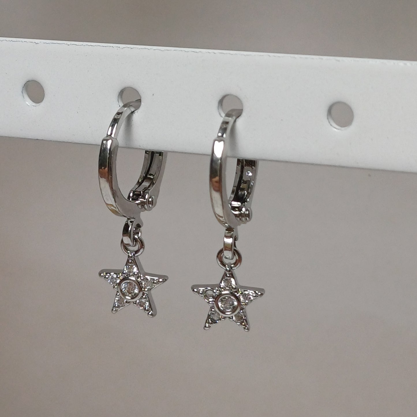 Sparkle star earrings.