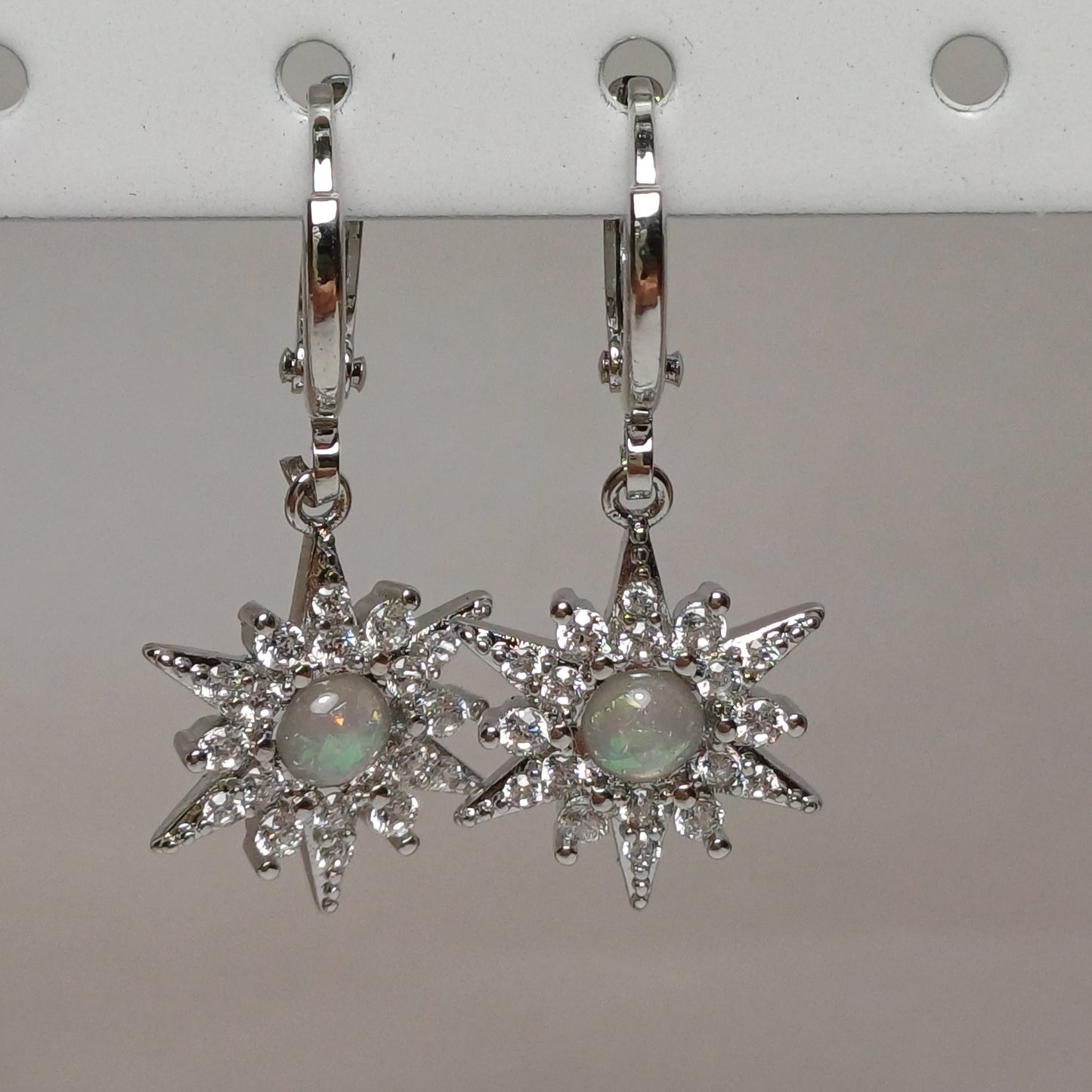 Rhinestone Sun earrings.