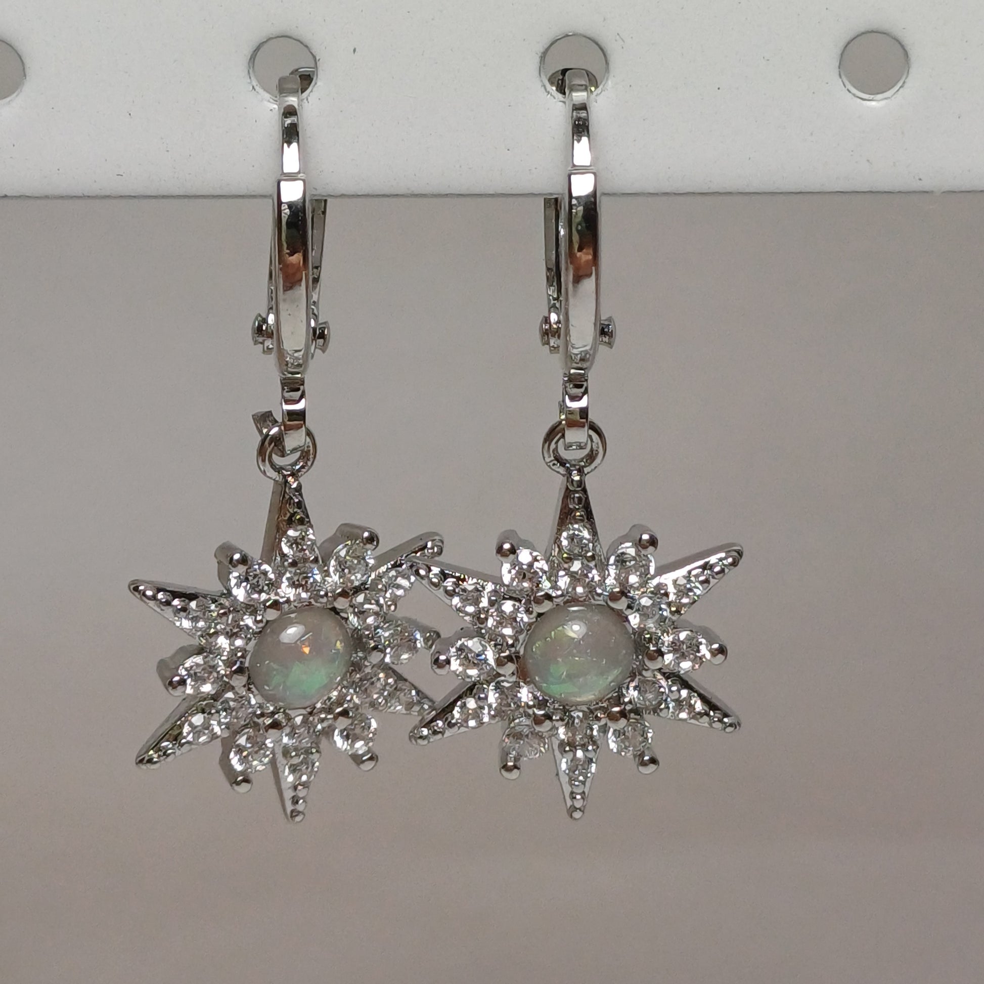 Rhinestone Sun earrings.