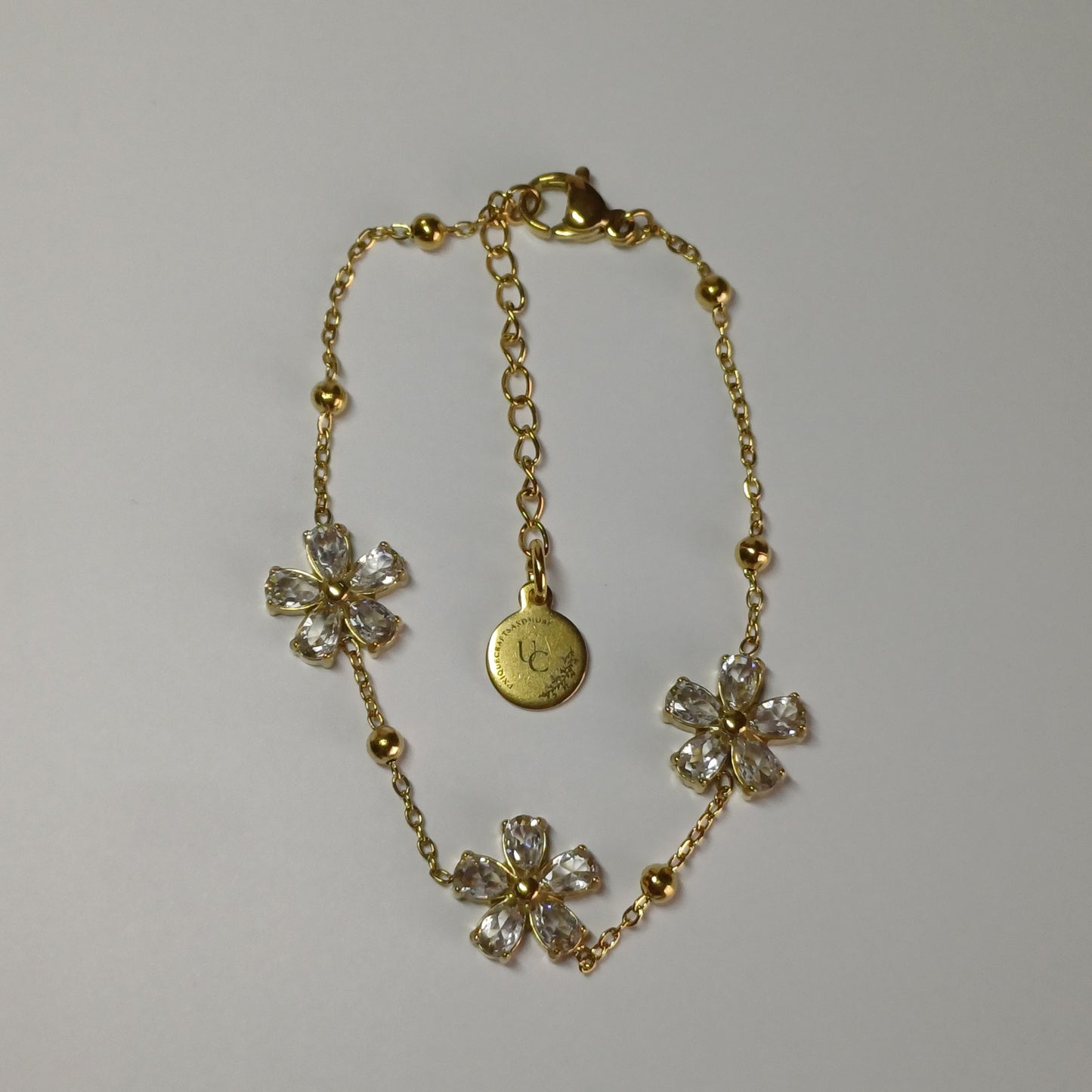 Gouden bloemen armband