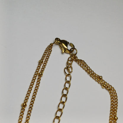 Dubbele armband met bolletjes