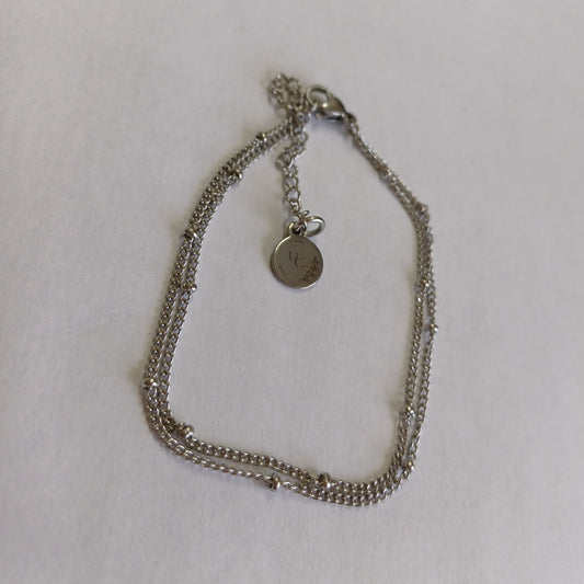 Dubbele armband met bolletjes