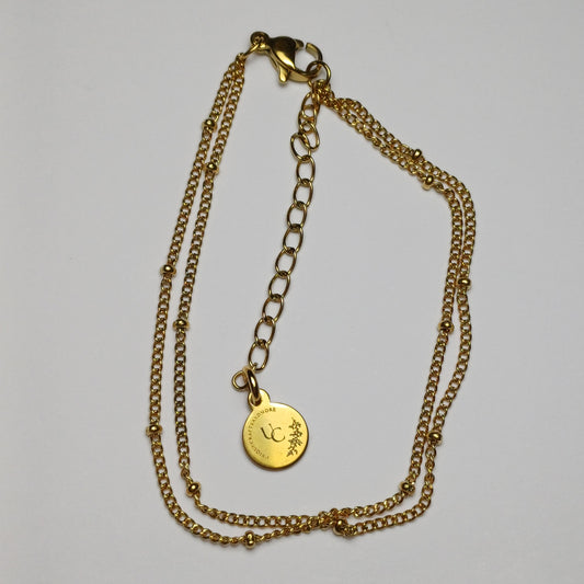 Dubbele armband met bolletjes