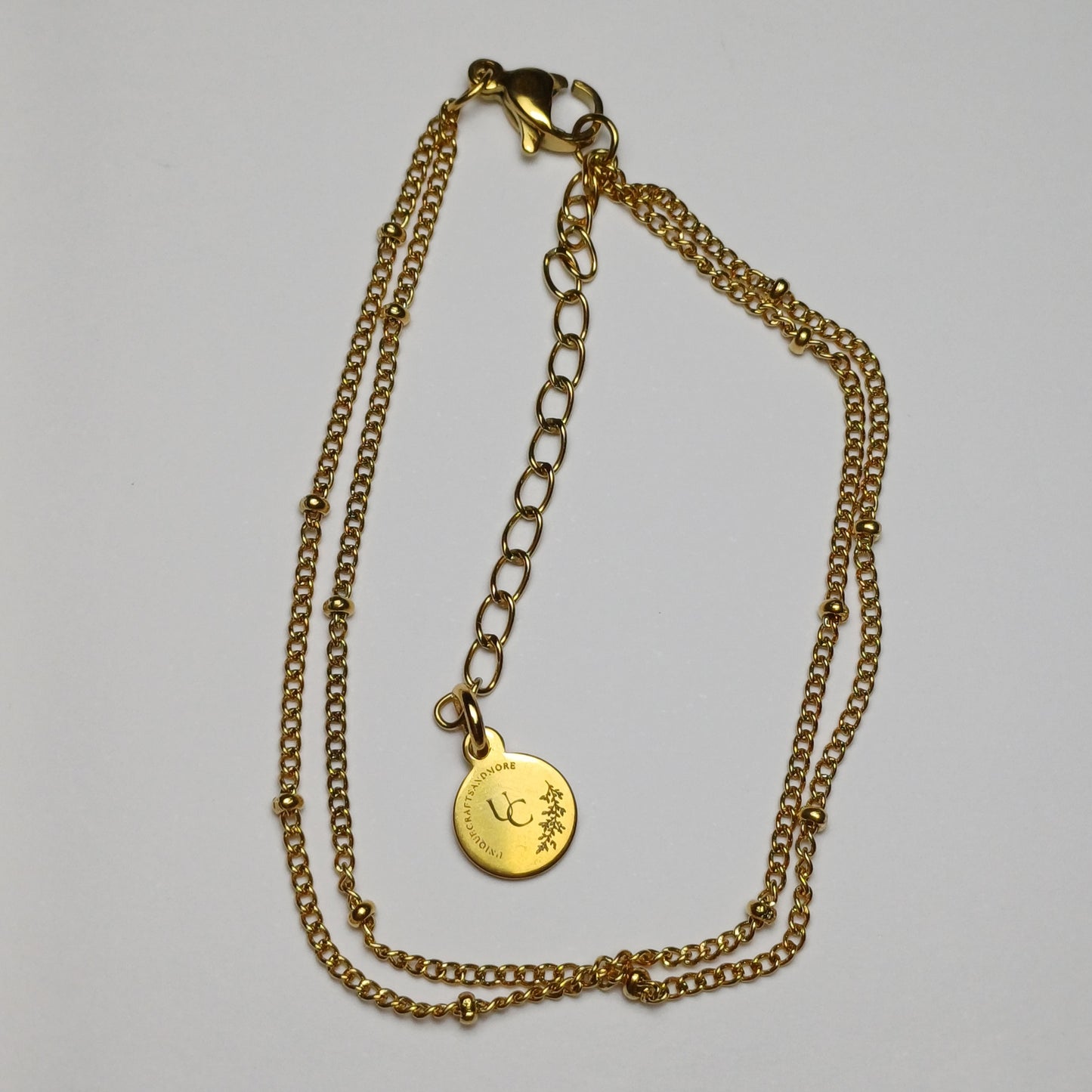 Dubbele armband met bolletjes