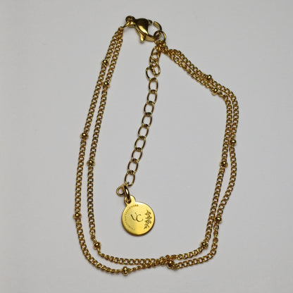Dubbele armband met bolletjes