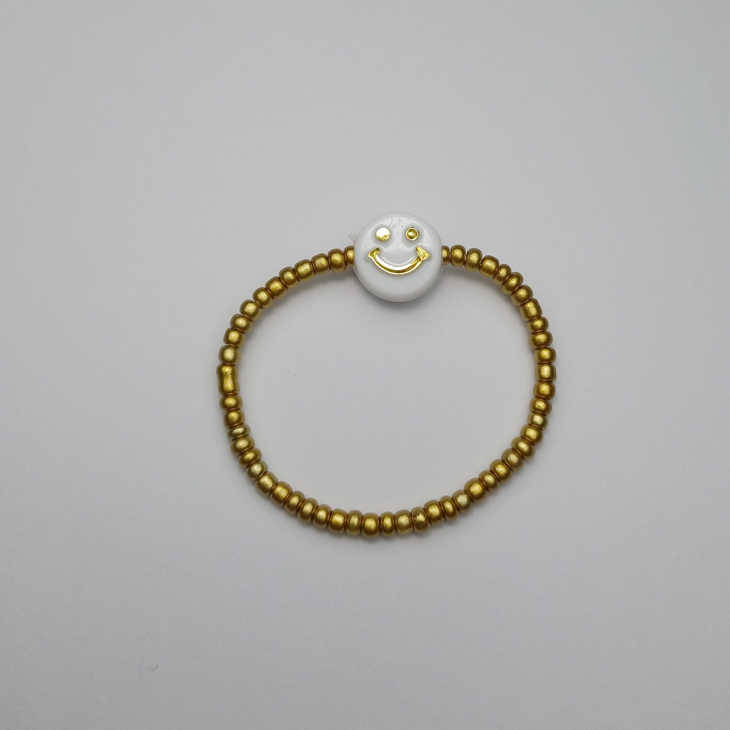 Gold smiley children's bracelet